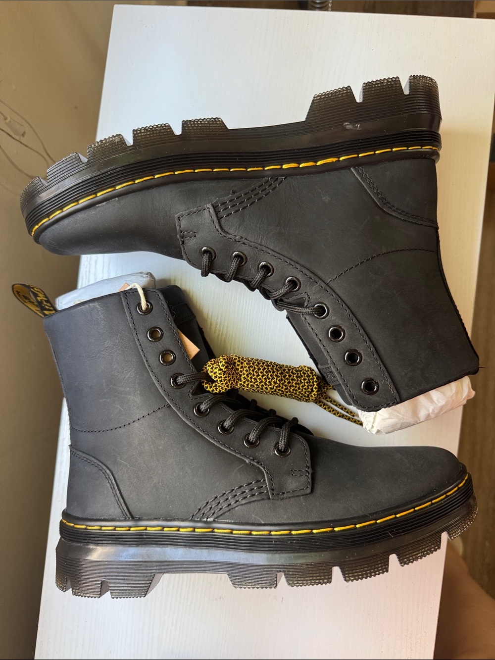 Dr. Martens Black Leather Combat Boots with Yellow Stitching